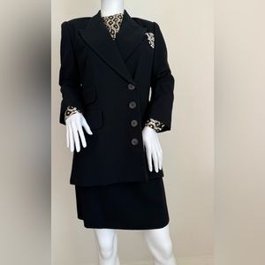 Black, fully lined textured wool suit with leopard print hankie and blouse.